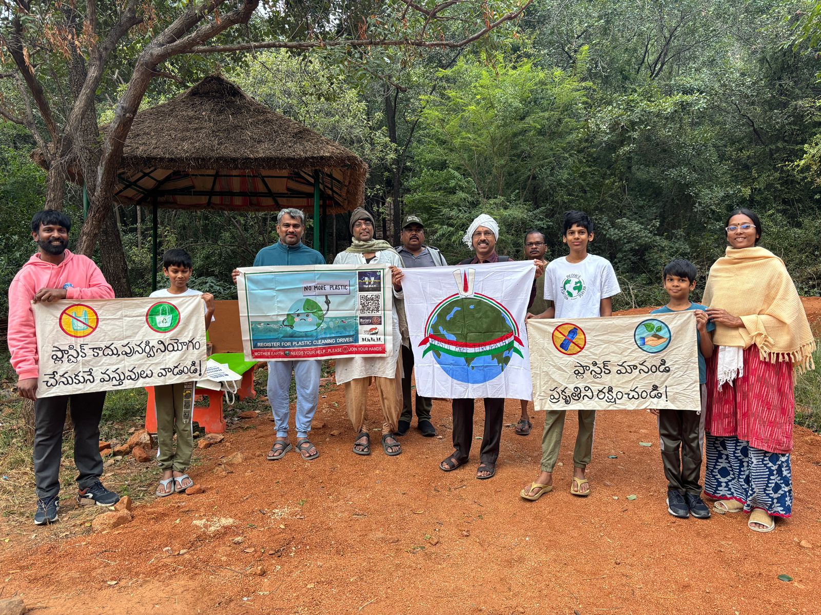 Volunteers cleaning up a river bank together